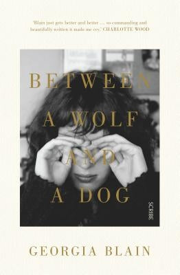 Between a Wolf and a Dog by Blain, Georgia